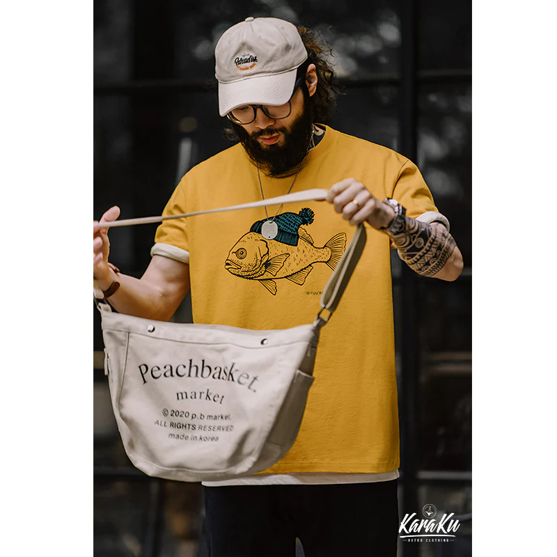 「ニット帽をかぶった深海魚」フロッキープリントコットンTee - Image 7